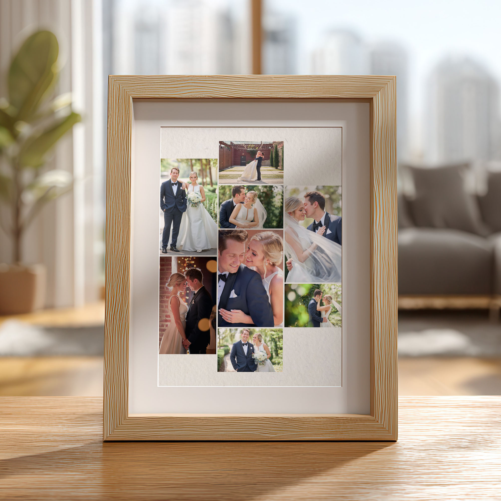 A photo collage of a wedding inside a frame sitting on a desk.