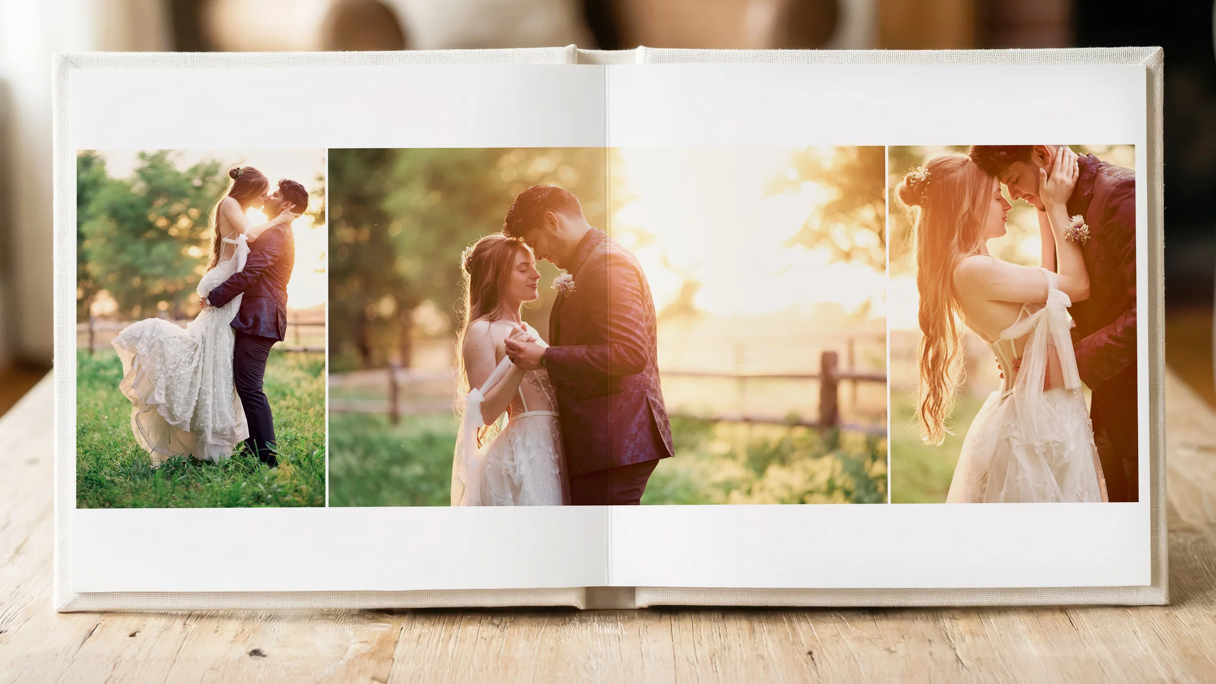 Open wedding album displaying a warm three-photo spread.