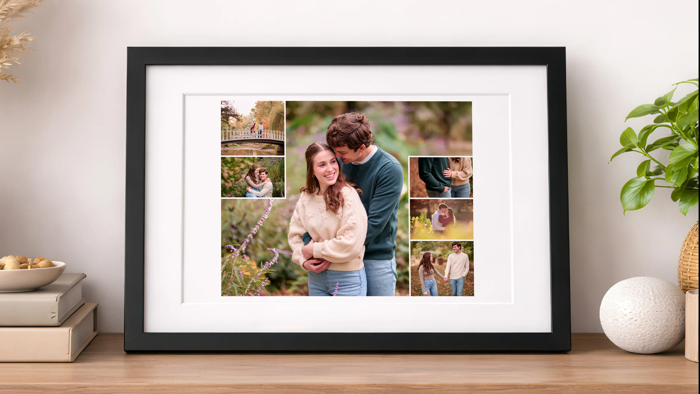 Framed photo collage displayed on a tabletop in a bright room.